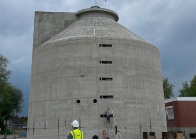 Faulturm mit Trichter und Kegeldach und zusätzlich ein offener Schlammspeicher mit Trichter von RSB Formwork Technology GmbH gebaut